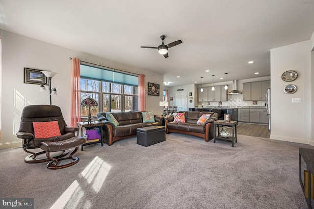 126 Lennox Ct, Camden Wyoming, DE 19934 - carpeted living room with a ceiling fan, recessed lighting, and baseboards