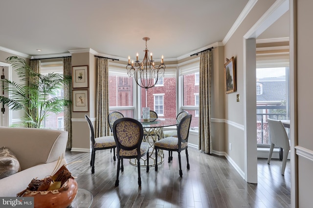 110 N Duke St Unit 201, Lancaster, PA 17602 - dining area featuring a chandelier, baseboards, dark wood-type flooring, and ornamental molding