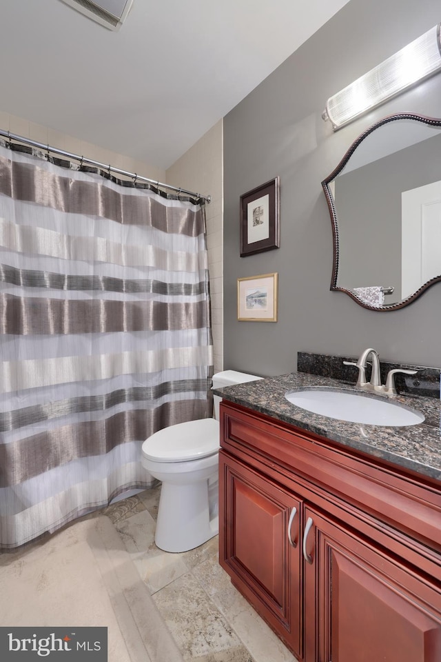 110 N Duke St Unit 201, Lancaster, PA 17602 - bathroom featuring vanity, marble finish flooring, and toilet