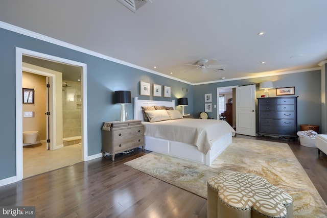 110 N Duke St Unit 201, Lancaster, PA 17602 - bedroom with wood finished floors, crown molding, baseboards, recessed lighting, and connected bathroom