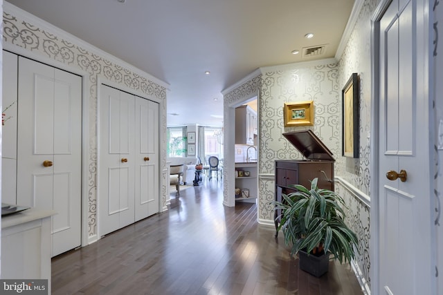 110 N Duke St Unit 201, Lancaster, PA 17602 - entryway featuring wallpapered walls, ornamental molding, wood finished floors, and recessed lighting