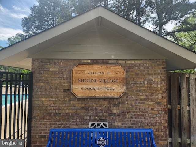 9505 Spinet Ct, Vienna, VA 22182 - exterior view of a pool and brick siding