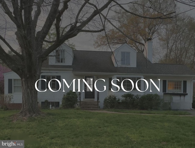 2502 Londonderry Rd, Alexandria, VA 22308 - view of front facade with a chimney, a front yard, and roof with shingles