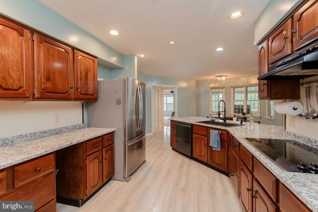 1492 Cumberland Dr, Rockingham, VA 22801 - kitchen with a sink, black appliances, light wood finished floors, recessed lighting, and under cabinet range hood