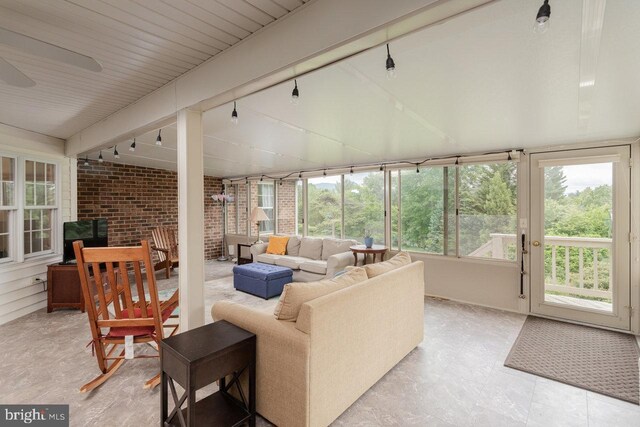 1492 Cumberland Dr, Rockingham, VA 22801 - sunroom / solarium with brick wall and rail lighting