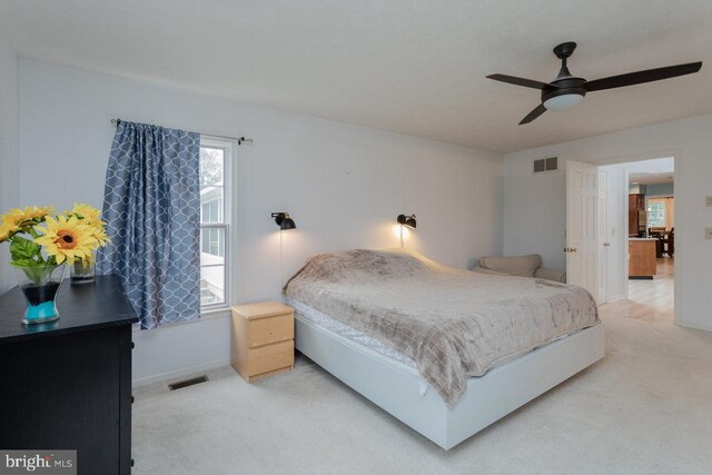 1492 Cumberland Dr, Rockingham, VA 22801 - bedroom with light colored carpet, baseboards, and a ceiling fan