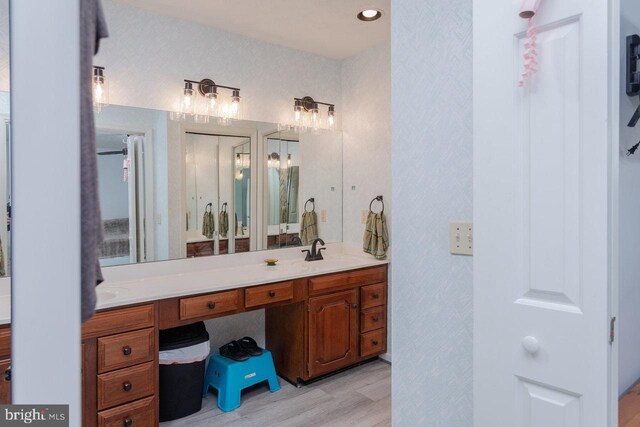1492 Cumberland Dr, Rockingham, VA 22801 - bathroom with wood finished floors and double vanity