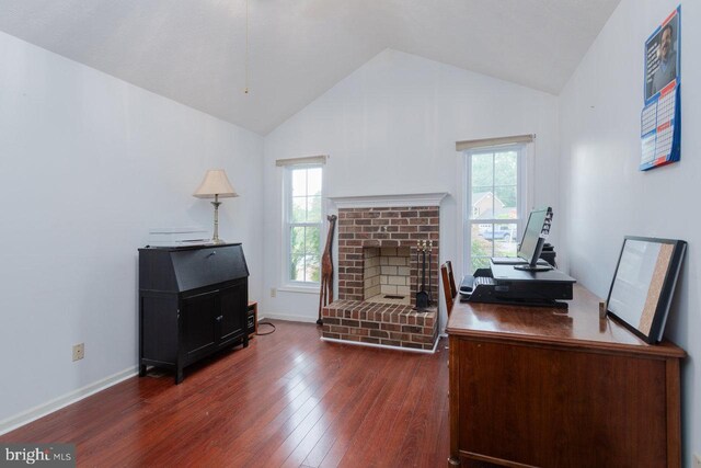 1492 Cumberland Dr, Rockingham, VA 22801 - home office featuring wood finished floors, plenty of natural light, a brick fireplace, baseboards, and high vaulted ceiling