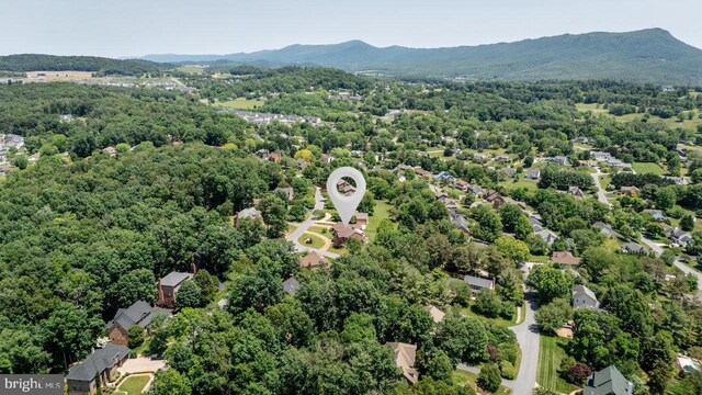 1492 Cumberland Dr, Rockingham, VA 22801 - drone / aerial view of a mountain backdrop and a heavily wooded area