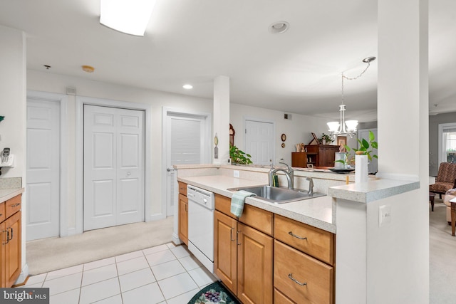 9718 Winery Ct Unit 9718, Gaithersburg, MD 20879 - kitchen featuring white dishwasher, a sink, light colored carpet, light countertops, and a chandelier