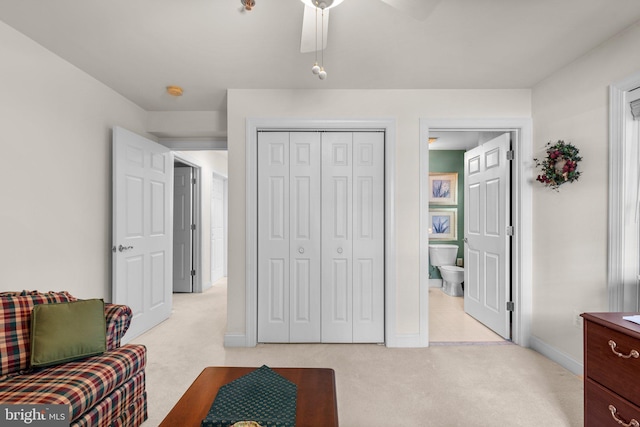 9718 Winery Ct Unit 9718, Gaithersburg, MD 20879 - bedroom featuring light carpet, baseboards, a closet, connected bathroom, and a ceiling fan