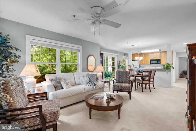 9718 Winery Ct Unit 9718, Gaithersburg, MD 20879 - living room with light carpet, a chandelier, and ceiling fan