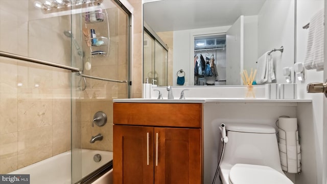 7333 New Hampshire Ave Unit 800, Takoma Park, MD 20912 - full bath featuring bath / shower combo with glass door, vanity, and toilet