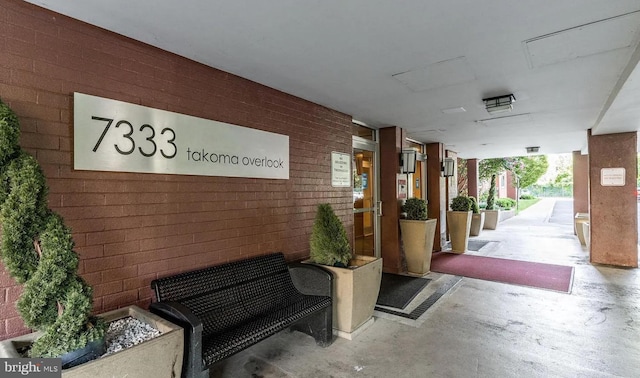 7333 New Hampshire Ave Unit 800, Takoma Park, MD 20912 - building lobby featuring brick wall