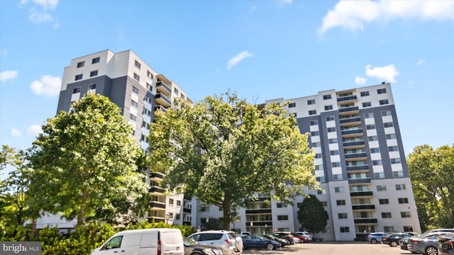 7333 New Hampshire Ave Unit 800, Takoma Park, MD 20912 - view of apartment building / complex with uncovered parking