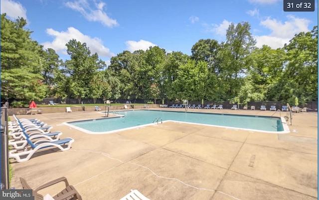 7333 New Hampshire Ave Unit 800, Takoma Park, MD 20912 - community pool with a patio area and view of wooded area