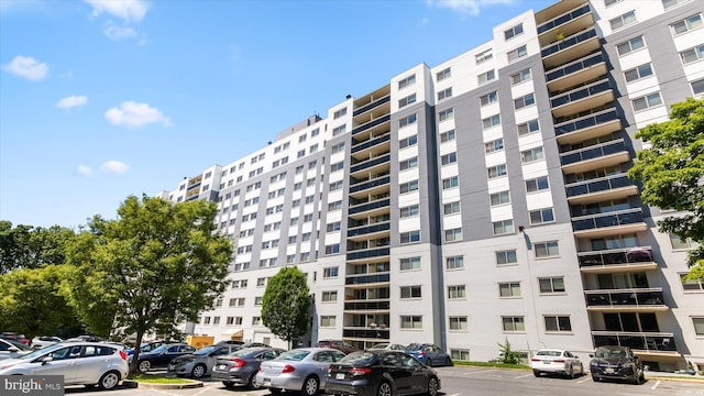 7333 New Hampshire Ave Unit 800, Takoma Park, MD 20912 - view of apartment building / complex featuring uncovered parking