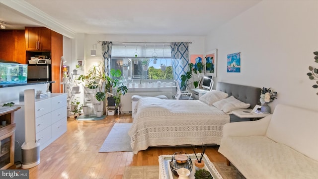 7333 New Hampshire Ave Unit 800, Takoma Park, MD 20912 - bedroom with light wood-style flooring