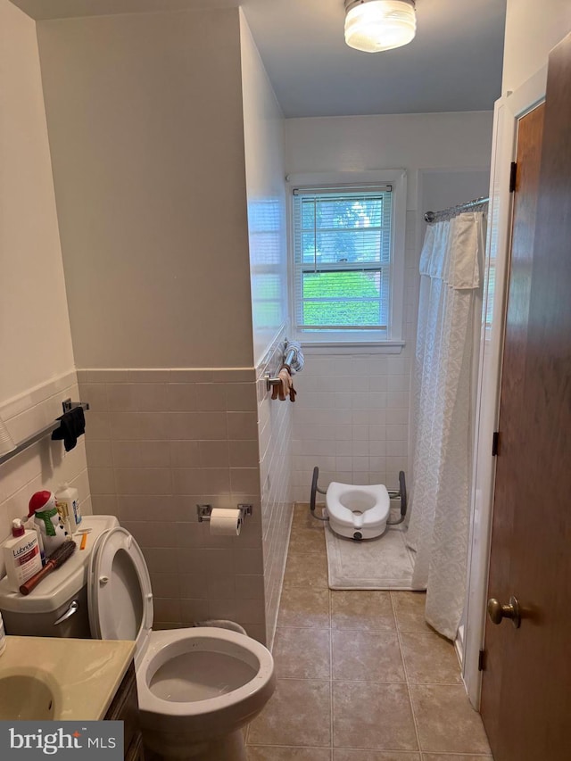 228 S Forge Rd, Palmyra, PA 17078 - bathroom featuring toilet, tile walls, tile patterned flooring, vanity, and a shower with shower curtain