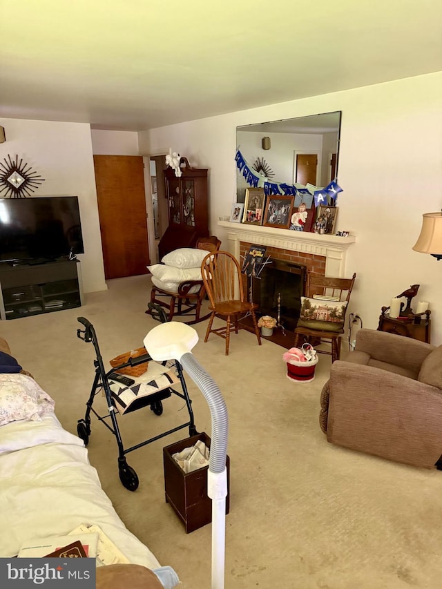 228 S Forge Rd, Palmyra, PA 17078 - carpeted living room featuring a brick fireplace