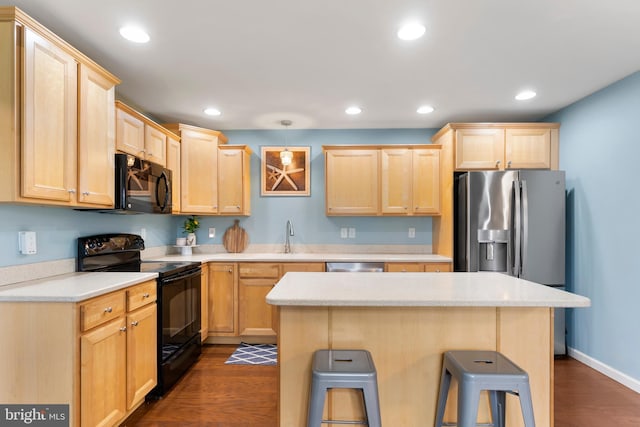 1900 Preserve Ln, Palmyra, PA 17078 - kitchen featuring black appliances, light brown cabinets, dark wood-style flooring, light countertops, and recessed lighting