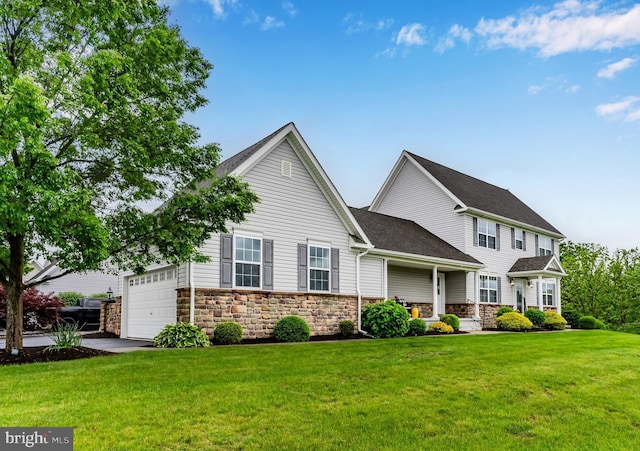 1900 Preserve Ln, Palmyra, PA 17078 - view of front of home featuring a front yard, stone siding, a garage, and roof with shingles
