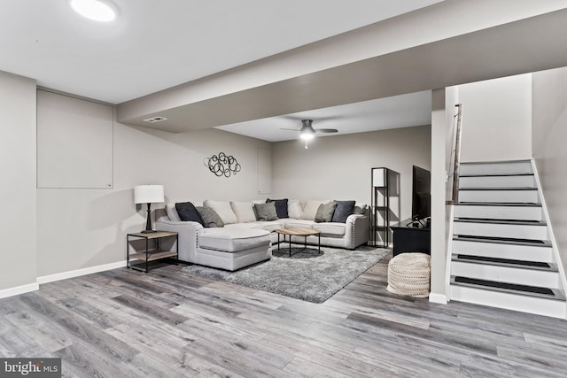 1900 Preserve Ln, Palmyra, PA 17078 - living area featuring wood finished floors, stairway, and ceiling fan
