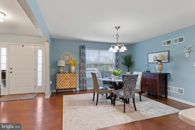 1900 Preserve Ln, Palmyra, PA 17078 - dining space featuring a chandelier and dark wood-type flooring