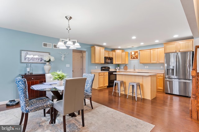 1900 Preserve Ln, Palmyra, PA 17078 - dining space featuring dark wood finished floors, recessed lighting, and a chandelier