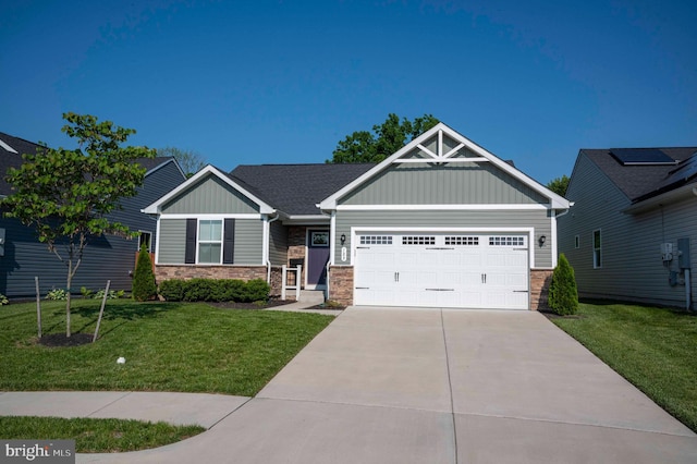 189 Massie St, Stephens City, VA 22655 - craftsman-style home with board and batten siding, an attached garage, stone siding, a front lawn, and concrete driveway