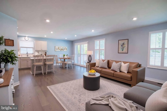 189 Massie St, Stephens City, VA 22655 - living area with plenty of natural light, dark wood-type flooring, recessed lighting, and baseboards