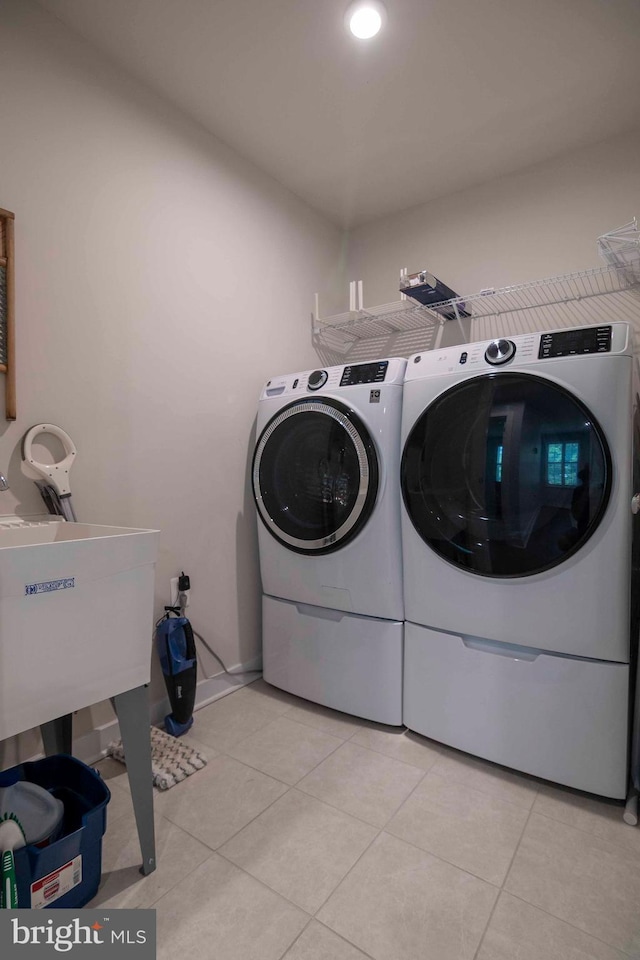 189 Massie St, Stephens City, VA 22655 - laundry area featuring light tile patterned floors, washing machine and clothes dryer, and recessed lighting