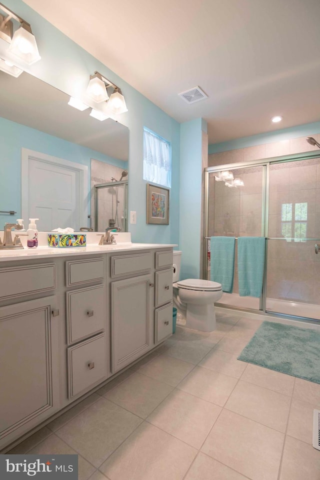 189 Massie St, Stephens City, VA 22655 - bathroom with tile patterned flooring, vanity, a shower stall, toilet, and recessed lighting