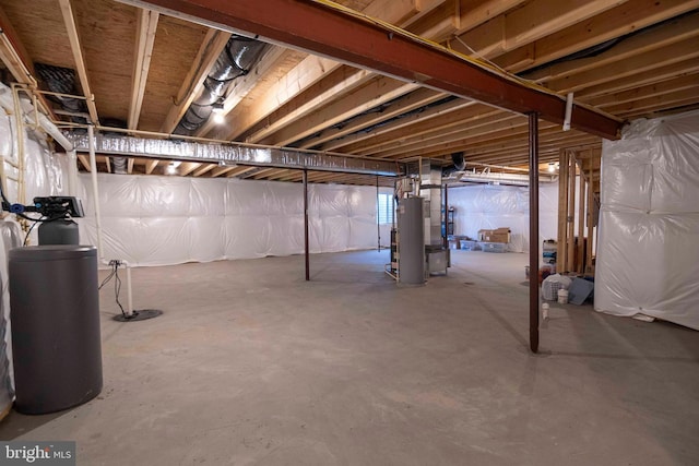 189 Massie St, Stephens City, VA 22655 - unfinished basement featuring a water softener and gas water heater