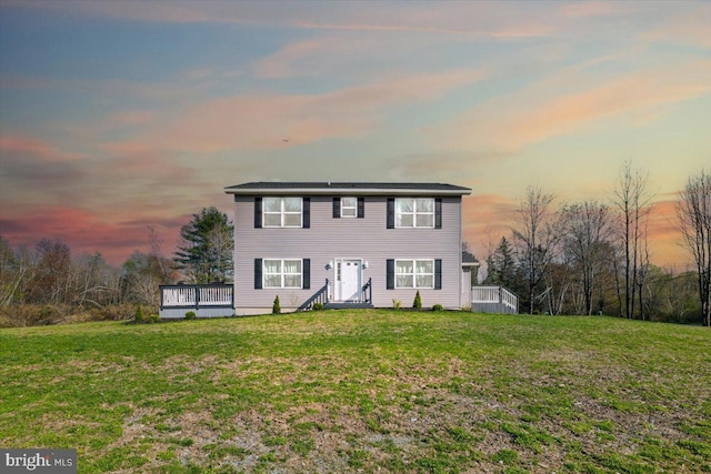 228 Cranberry Dr, Blakeslee, PA 18610 - colonial-style house with a yard and a wooden deck