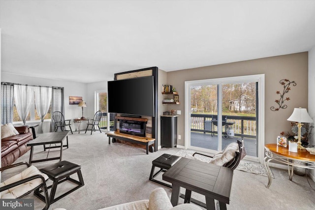 228 Cranberry Dr, Blakeslee, PA 18610 - living room featuring light carpet, plenty of natural light, and baseboards