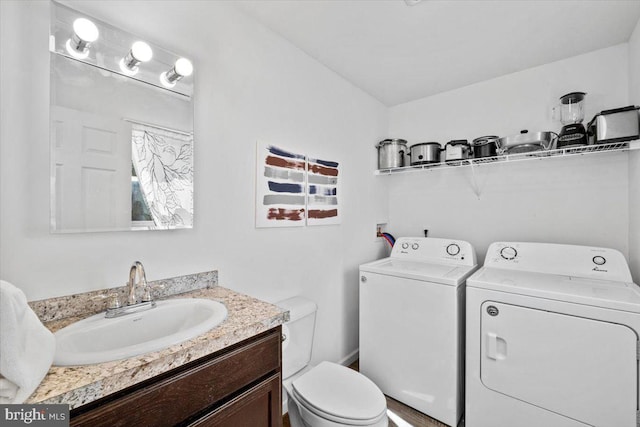228 Cranberry Dr, Blakeslee, PA 18610 - bathroom with washer and dryer, toilet, and vanity