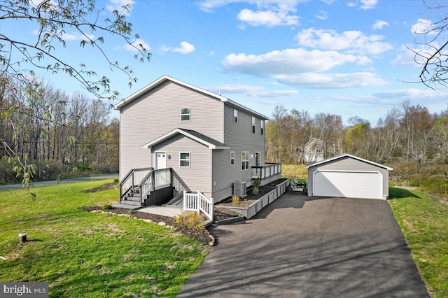 228 Cranberry Dr, Blakeslee, PA 18610 - view of side of property with an outbuilding, a garage, and a yard