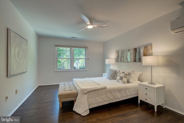 12013 Cheviot Dr, Herndon, VA 20170 - bedroom featuring a wall mounted air conditioner, dark wood-style floors, and a ceiling fan