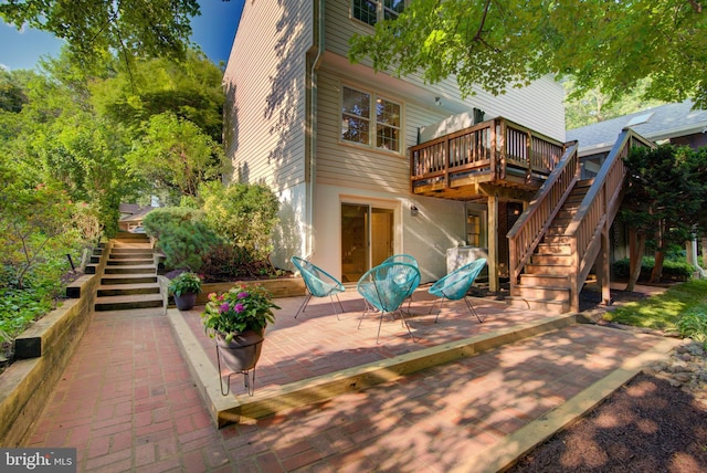 12013 Cheviot Dr, Herndon, VA 20170 - rear view of property with stairs, a wooden deck, and a patio area