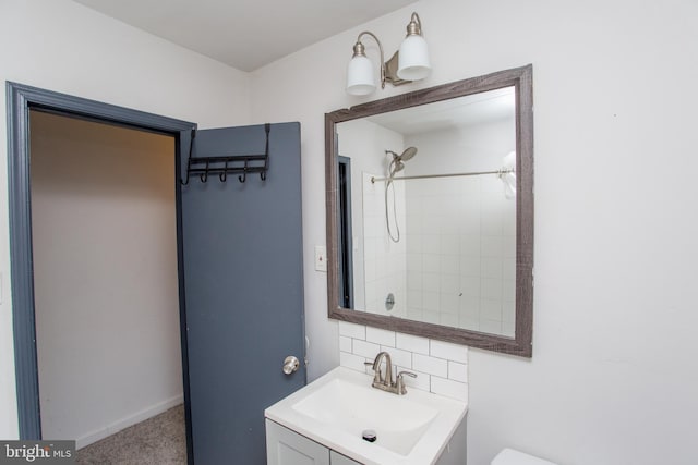 1525 W Cayuga St, Philadelphia, PA 19140 - bathroom with vanity, backsplash, a tile shower, and toilet