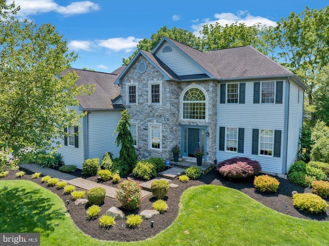 17 N Carolina Ave, Reading, PA 19608 - view of front of home with stone siding and a front lawn