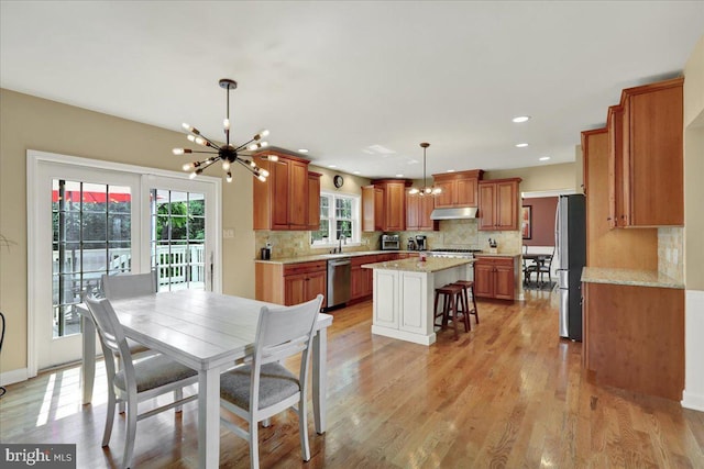 17 N Carolina Ave, Reading, PA 19608 - dining room with a chandelier, light wood-style floors, recessed lighting, and baseboards