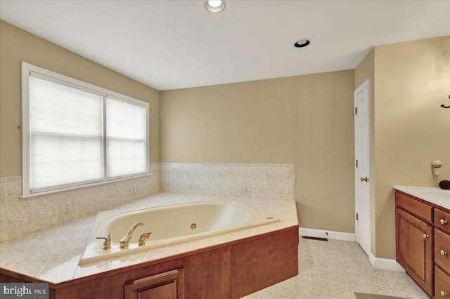 17 N Carolina Ave, Reading, PA 19608 - bathroom with a whirlpool tub, vanity, and tile patterned flooring