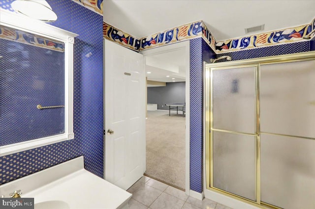 17 N Carolina Ave, Reading, PA 19608 - full bathroom featuring a stall shower, vanity, wallpapered walls, tile patterned flooring, and baseboards