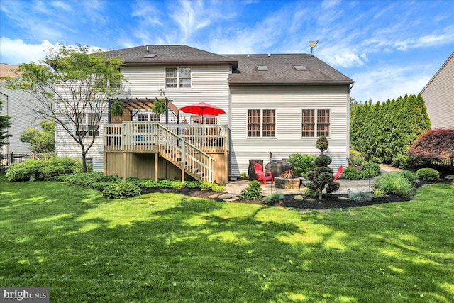 17 N Carolina Ave, Reading, PA 19608 - back of house with a wooden deck, a fire pit, stairs, and a shingled roof