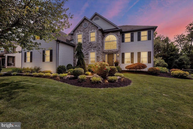 17 N Carolina Ave, Reading, PA 19608 - view of front of home featuring a front yard and stone siding