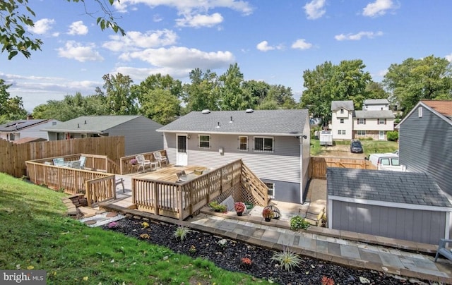 6715 Valley Park Rd, Capitol Heights, MD 20743 - rear view of house with a deck and a residential view