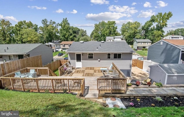 6715 Valley Park Rd, Capitol Heights, MD 20743 - back of house featuring a deck and a residential view
