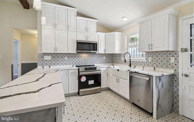 6715 Valley Park Rd, Capitol Heights, MD 20743 - kitchen featuring appliances with stainless steel finishes, lofted ceiling, white cabinetry, light flooring, and decorative backsplash